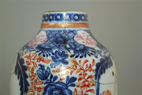 A pair of Chinese export famille rose ovoid vases, late Qianlong period, 21cm, faults